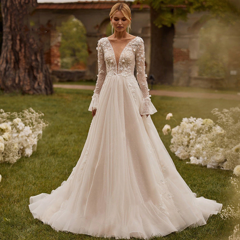 Sexy See-through Mariage manches longues Brodé Deep V robe de mariée puffy