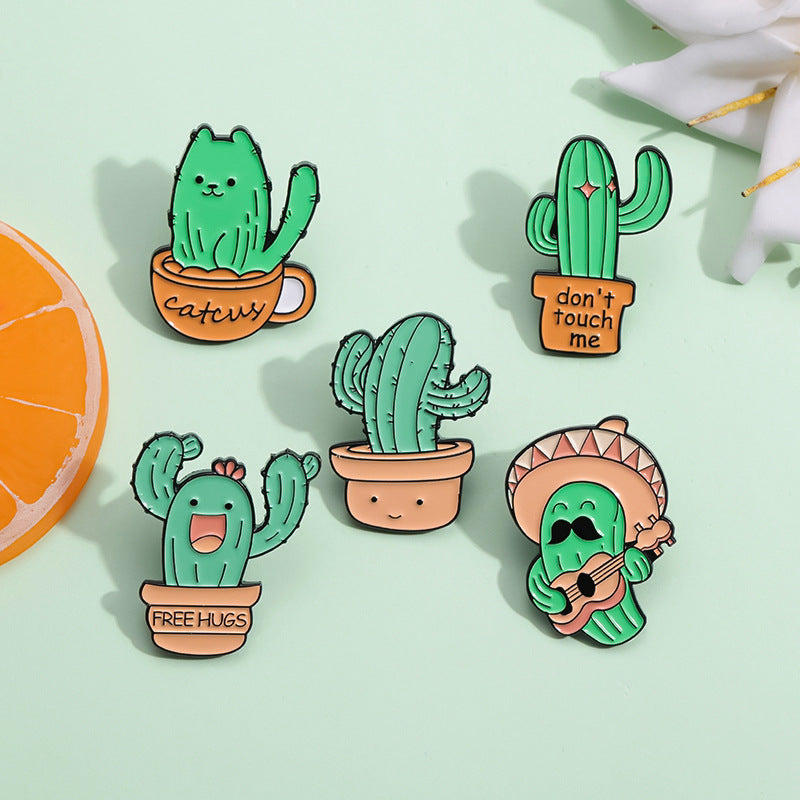 Mignon chant et danse Cactus forme Golden M Accessoires insigne