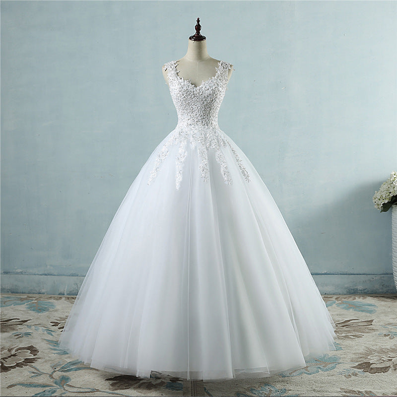 Robe de mariée haute taille avec col en V profond