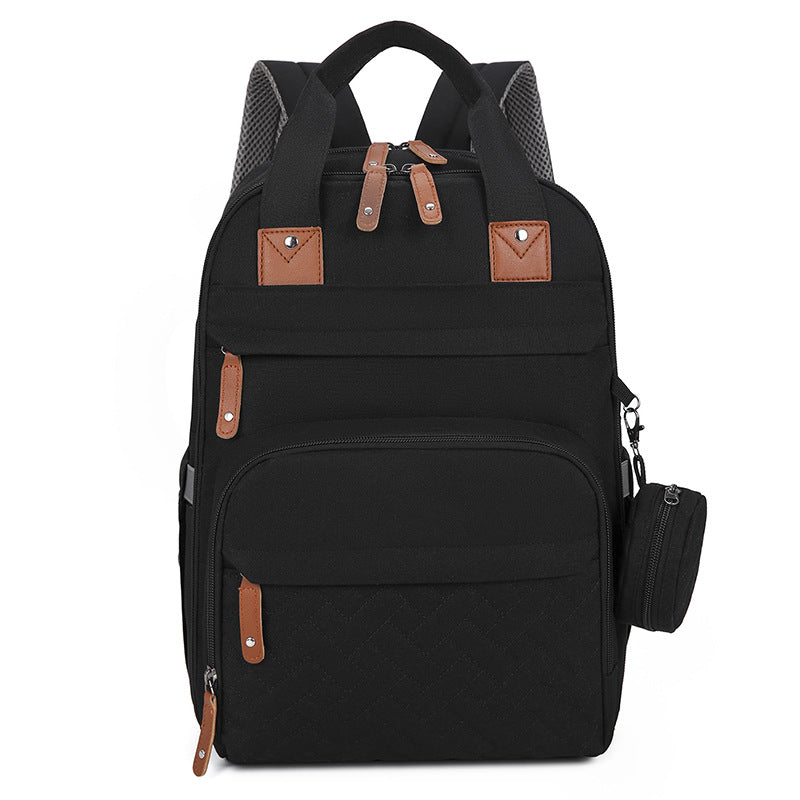 Sac à couches multifonctions avec un tampon à langer bébé et un compartiment chauffant