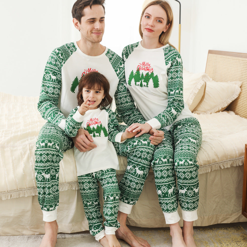Ensemble de famille de Noël de parents et d'enfants en couleur de col rond imprimé