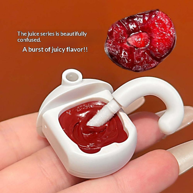 Orange Cat Lip Glaze Sheer et jeune avec une finition miroir comme Dewy