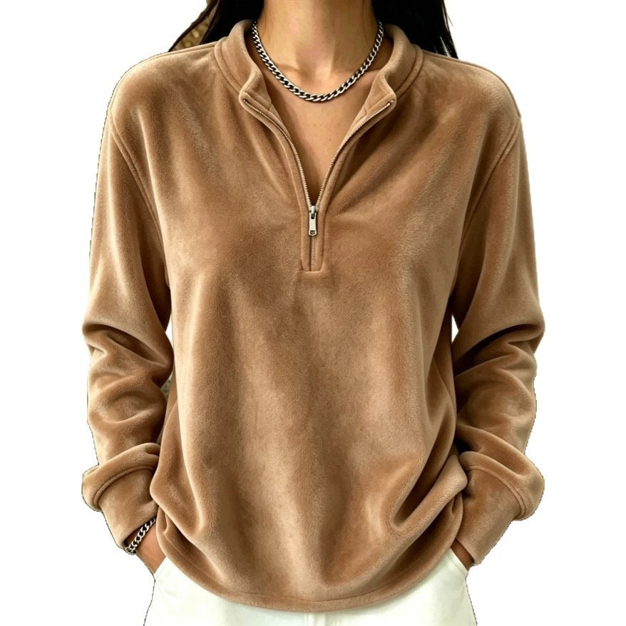 Top à manches longues de couleur unie avec un collier et une fermeture éclair