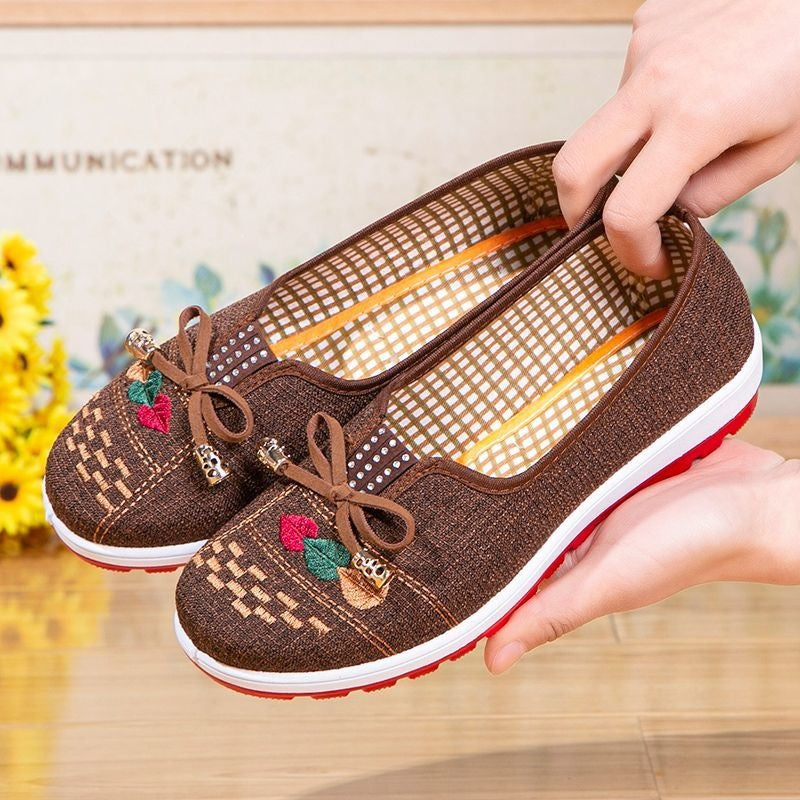 Chaussures en tissu brodé antidérapant avec une semelle souple