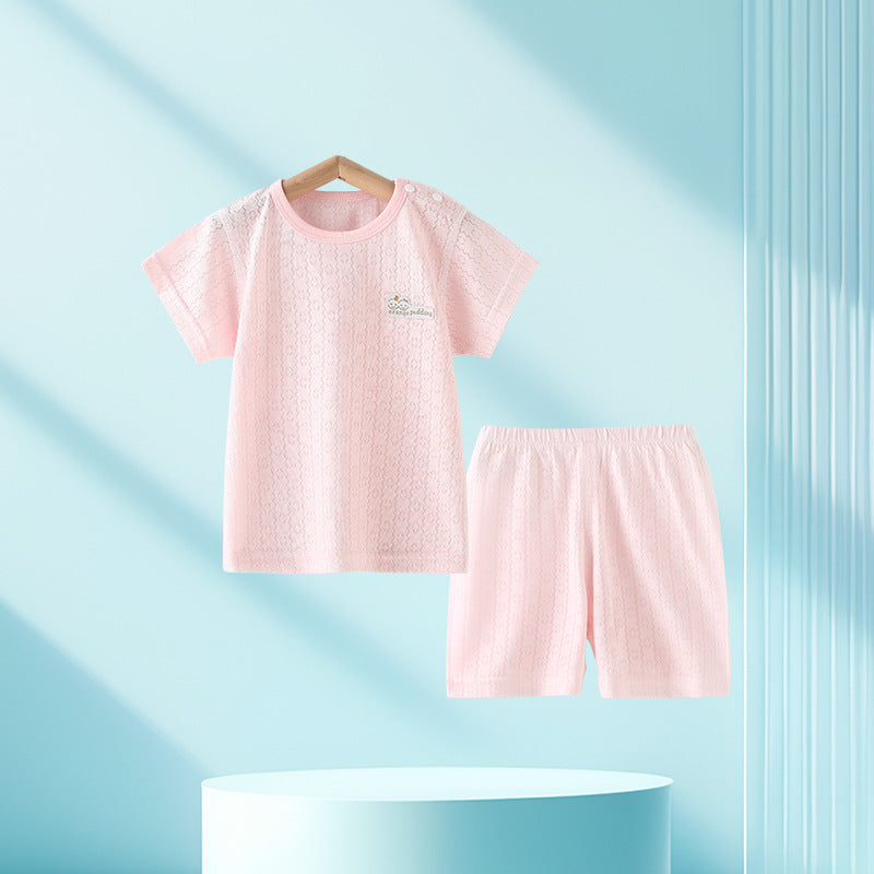 Le top et le short pour enfants deux-pièces d'été