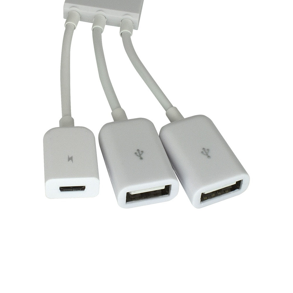 Téléphone mobile connecté au connecteur USB Keyboard Mouse
