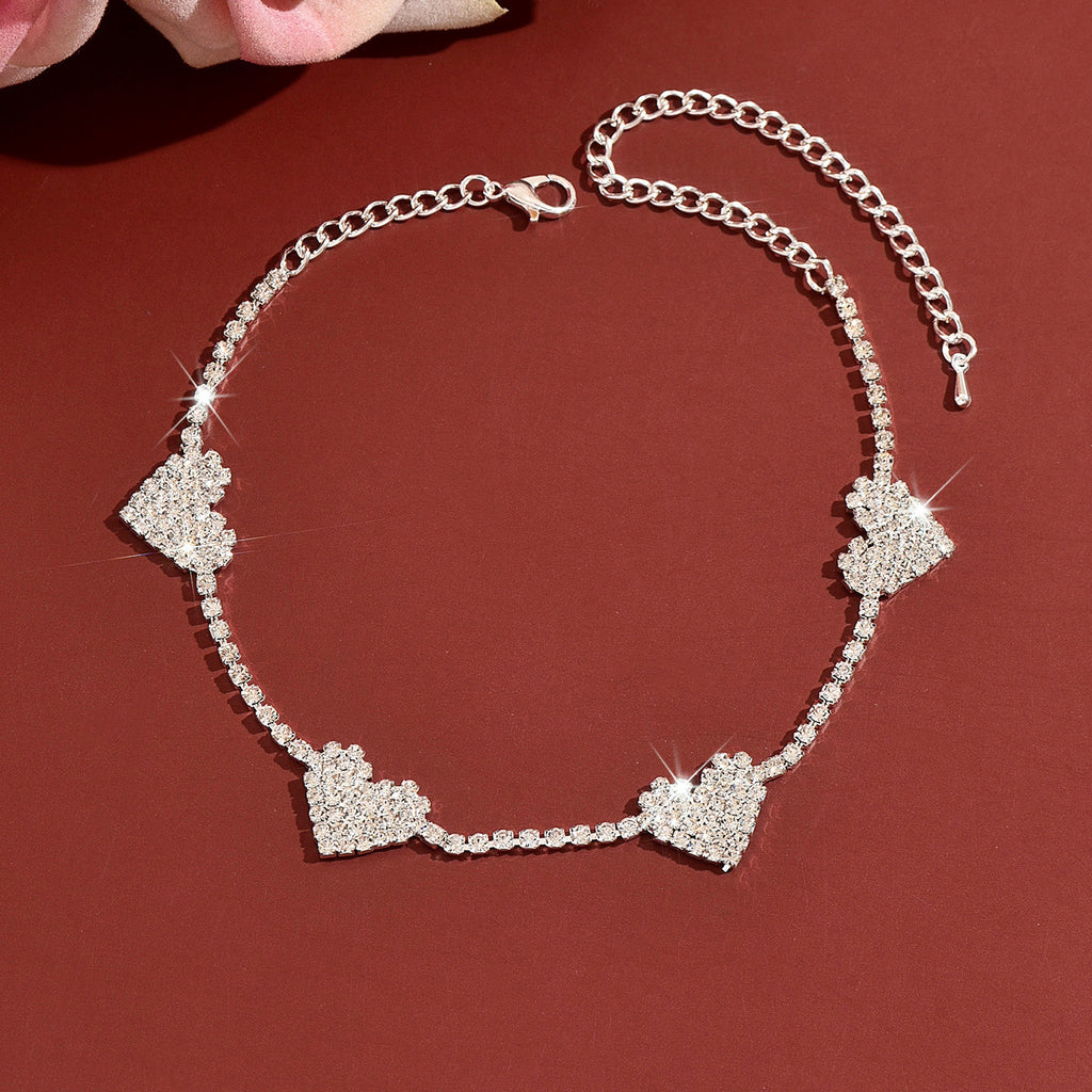 Femmes Quatre coeurs Pavés CZ Collier Choker