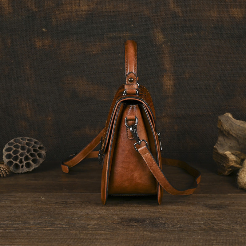 Sac à main artisanal avec une bande transversale et un design de bloc de couleur