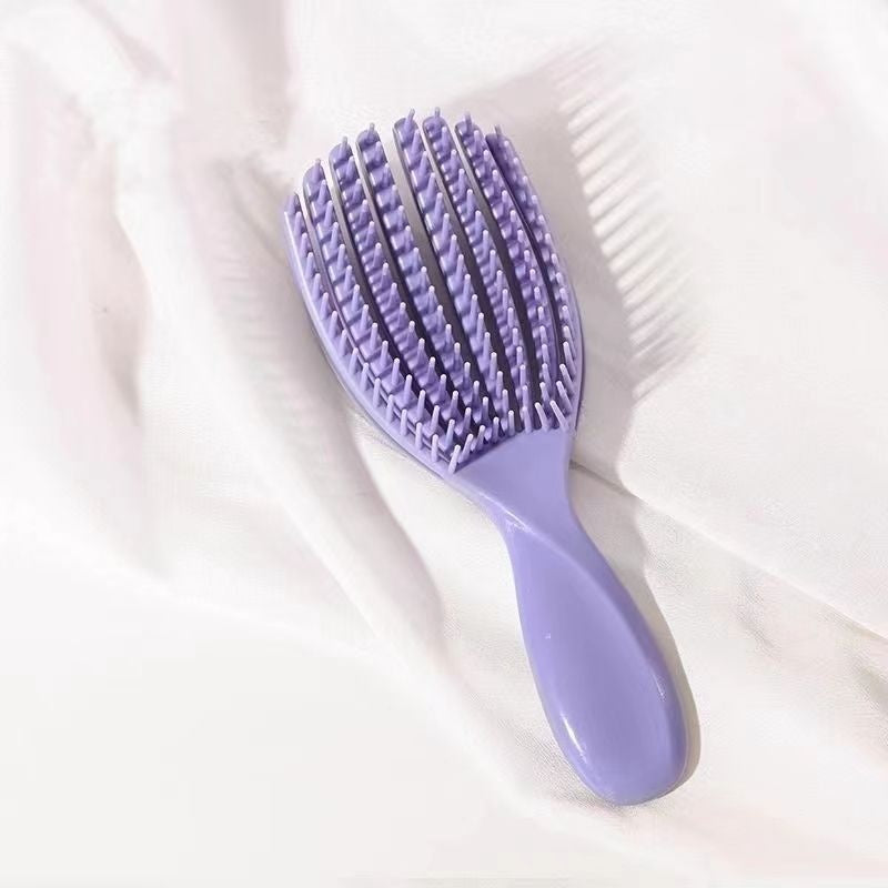 Multifunctional ribbed massage comb