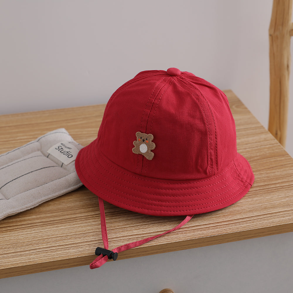 Chapeau de soleil d'été léger de couleur candy pour enfants avec cordon de serrage