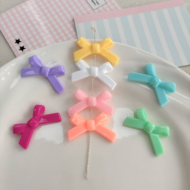 Perles d'espacement en forme de Bowknot acrylique