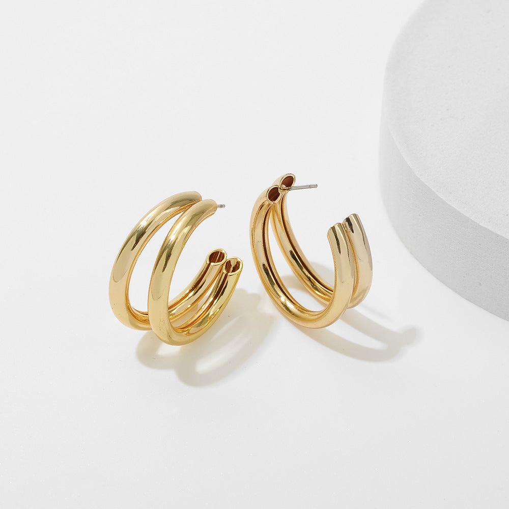 Boucles d'oreilles simples en métal double en forme de C