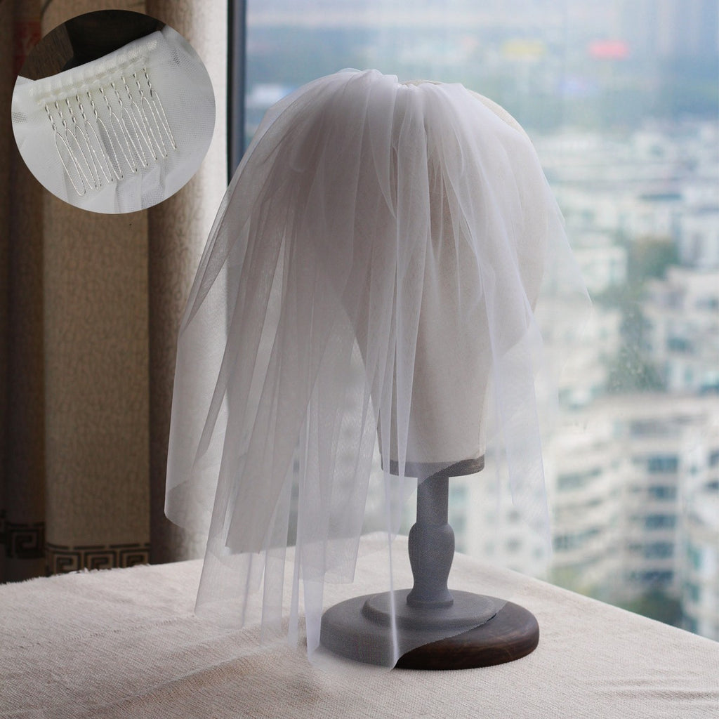 Rétro femme mariée courte coiffure mariée