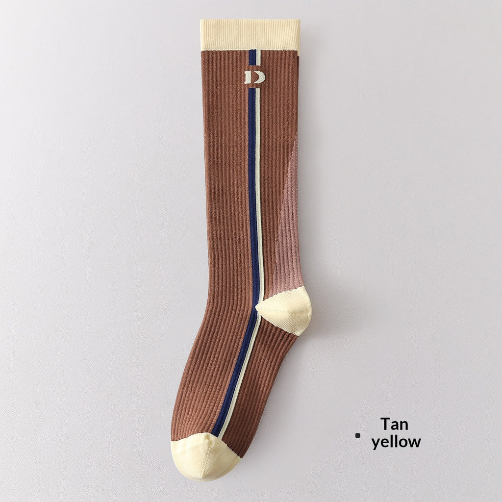 Chaussettes de calf à compression progressive pour femmes avec bandes de blocs de couleur