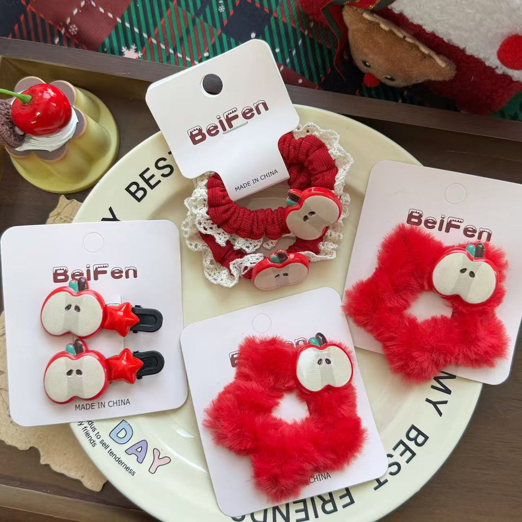 Cartoon créatif Apple et accessoires de coiffure Star avec thèmes de Noël et année