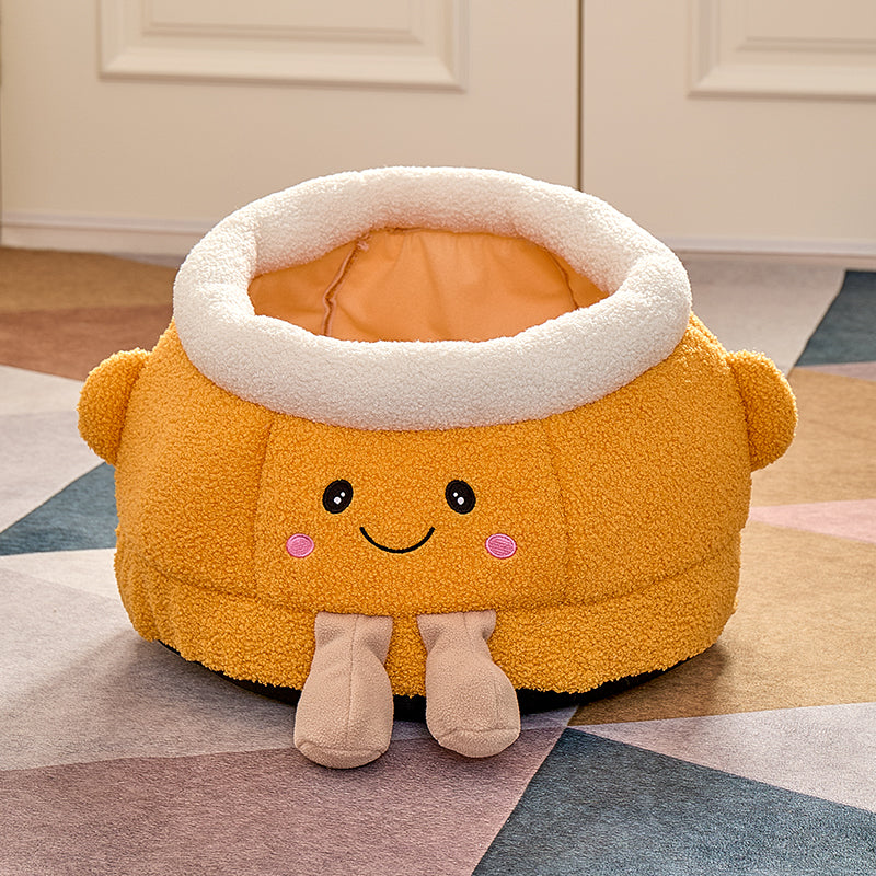 Lit de chat avec sourire orange