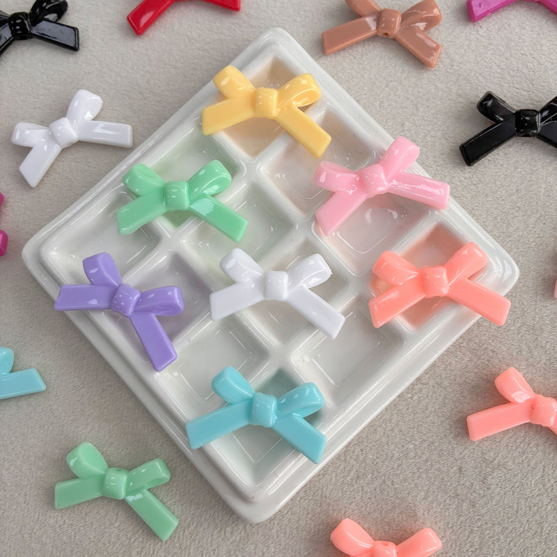 Perles d'espacement en forme de Bowknot acrylique
