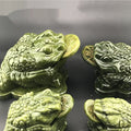 Bijoux de crapaud doré de Jade Sud