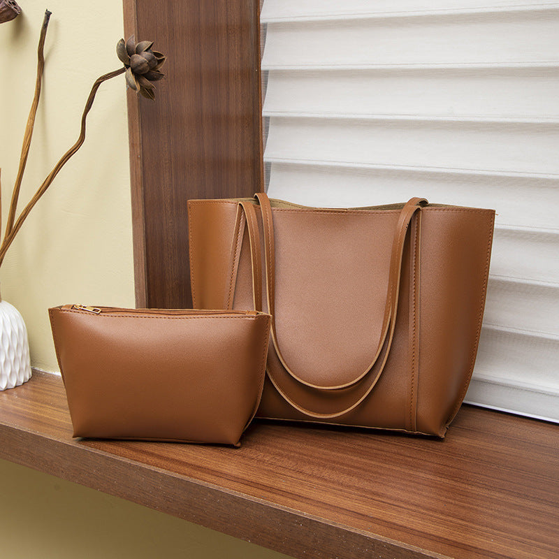 Ce sac à épaule multifonctionnel de style Niche est livré avec un plus petit