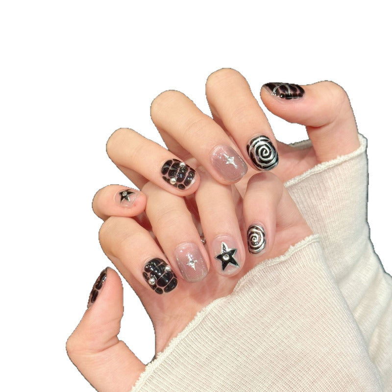Doucement cool et épicé style Tomboy peint à la main Niche haut de gamme flottant Conseils d'ongle portable