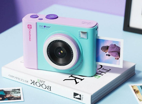 Mini caméra de film mignon qui produit instantanément des photos couleur