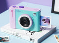 Mini caméra de film mignon qui produit instantanément des photos couleur