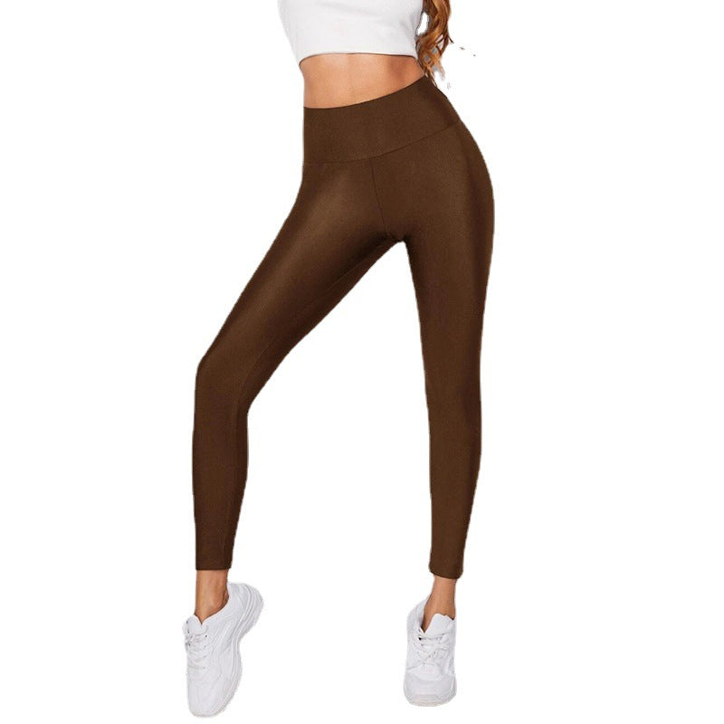 Style européen et américain Couleur Glossy Leggings haute taille Solid couleurs serrés Stretch Ca