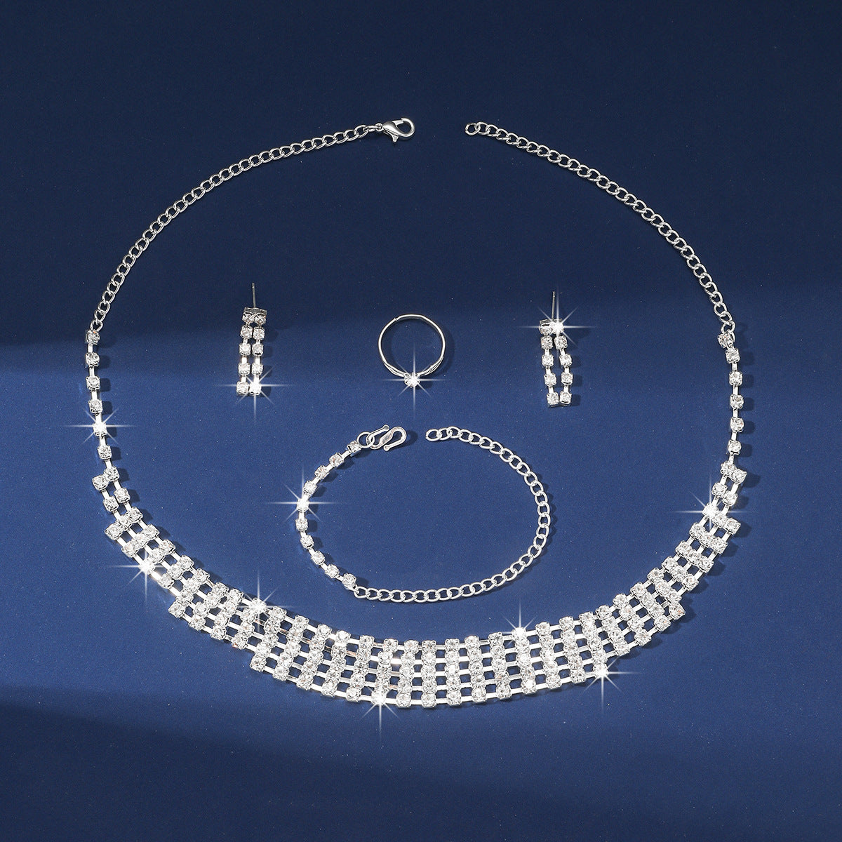 Boucles d'oreilles Bracelet collier chaîne à griffes Ensemble de quatre pièces