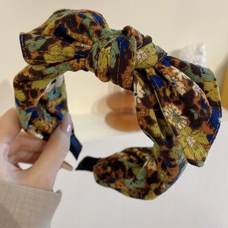 Simple bande de cheveux de tissu large bordé avec un motif imprimé et un noeud lié
