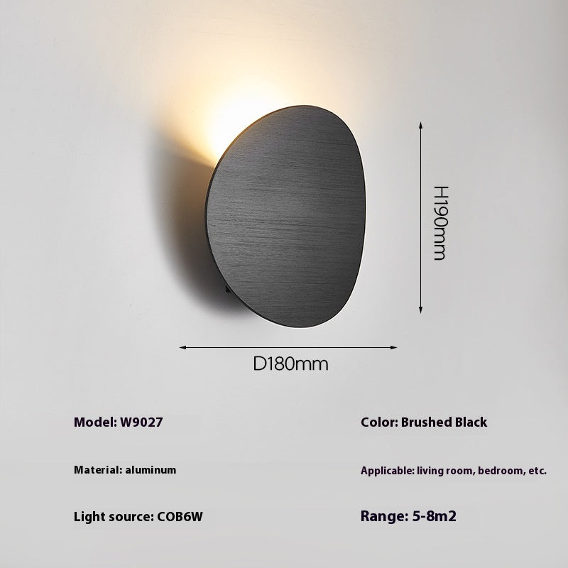 Lampe murale simple côté lit