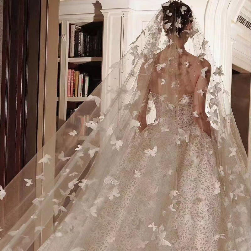 Veil à papillon tridimensionnel blanc nuptial
