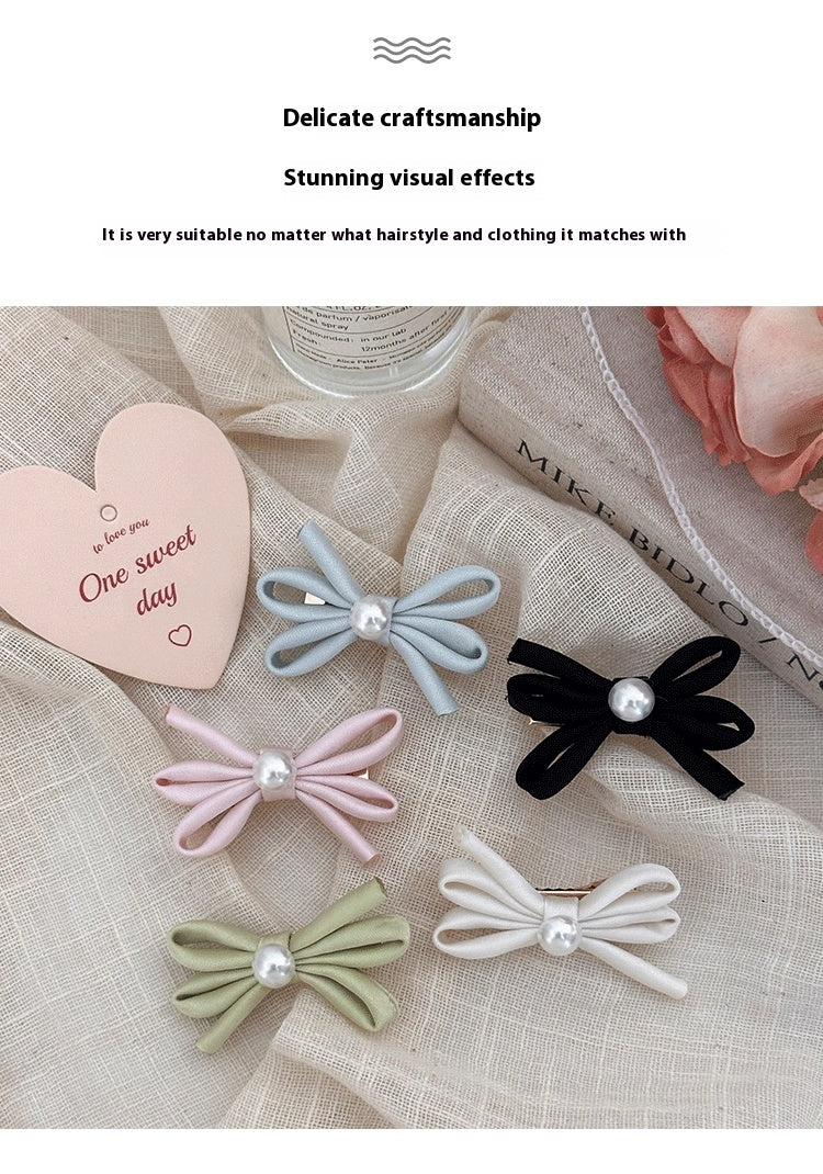 Clip latéral Bangs Pearl Bow Une paire de clips de canard