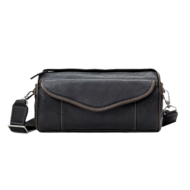 Vieux sac transversal en cuir à port manuel