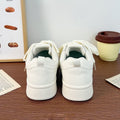 Style de sneakers blancs pour femmes