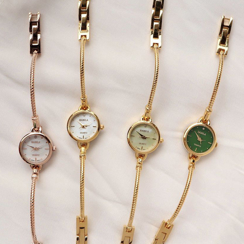 Rétro Petite montre dorée Quartz montre féminine