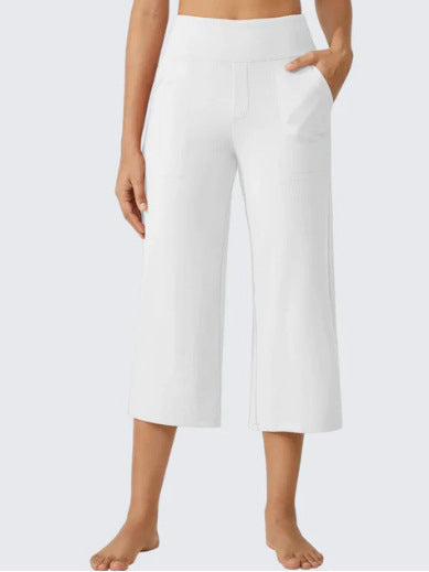 Les femmes haute taille emportent droit pantalons de yoga occasionnels avec des poches