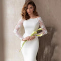 Robe de mariée en dentelle satinée à manches longues