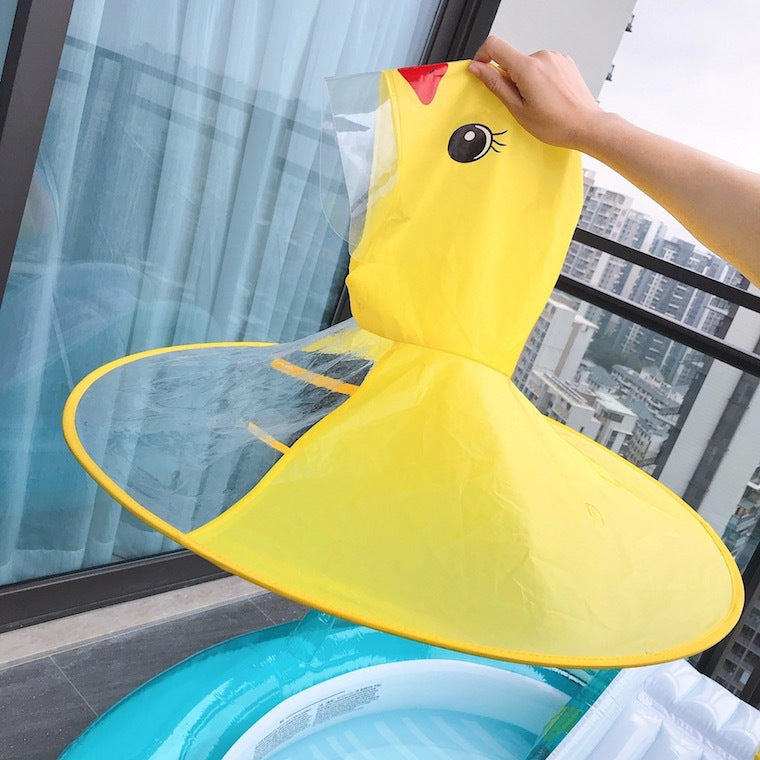 Petit canard jaune Saucer volant Enfants imperméable Caricature Poncho