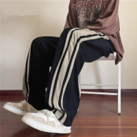 Pantalon de sport rayé homme avec deux bandes