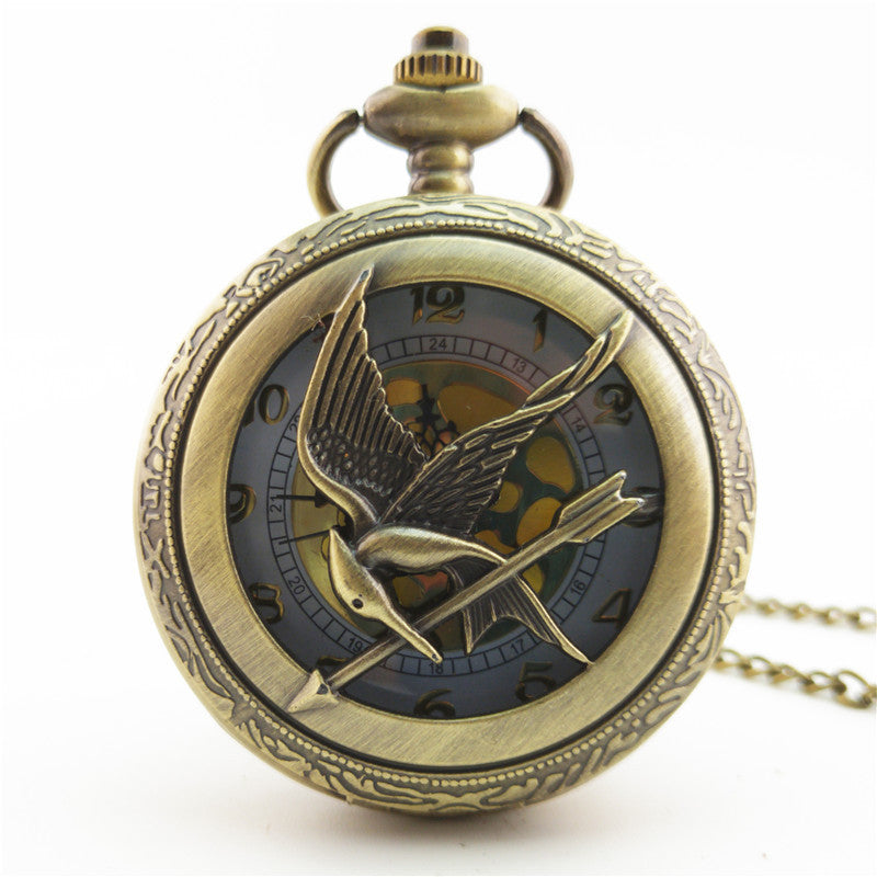 Vieille montre de poche fléchée aux gros oiseaux