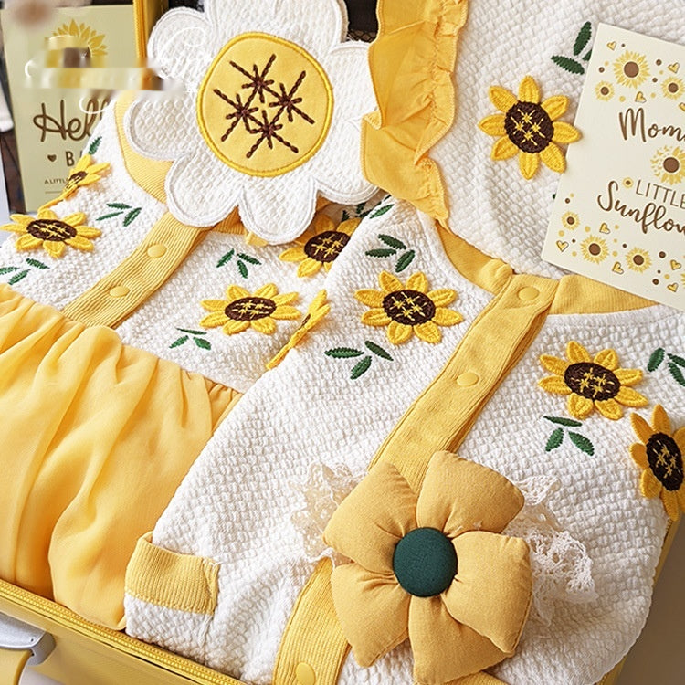 Ensemble cadeau bébé pour les nouvelles-nées avec une robe de tournesol jaune