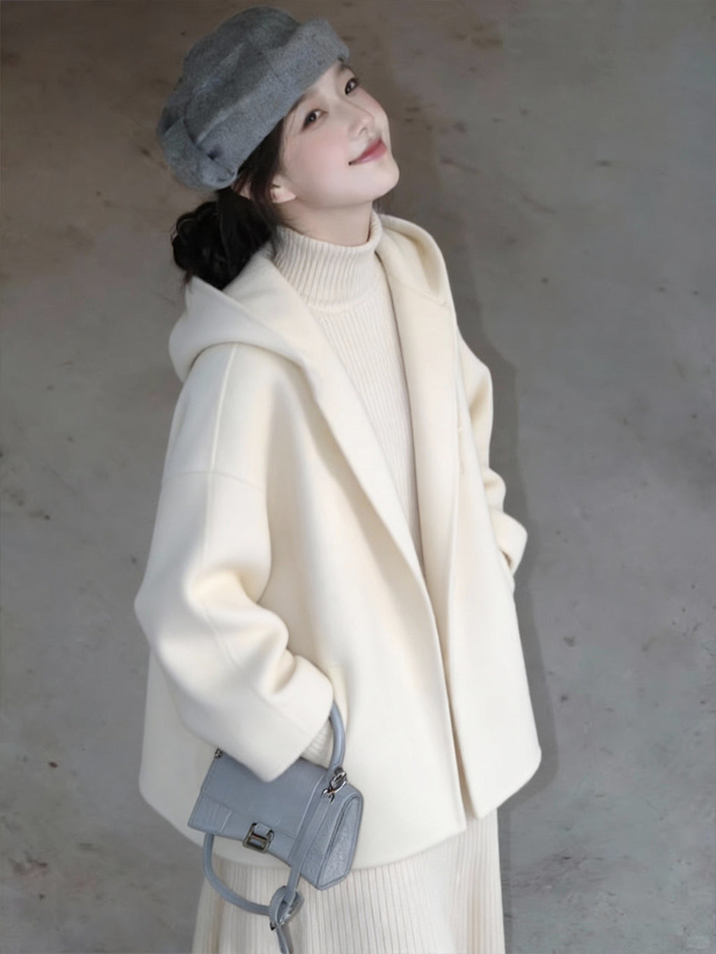Manteau de laine à capuche blanche à double face pour femmes