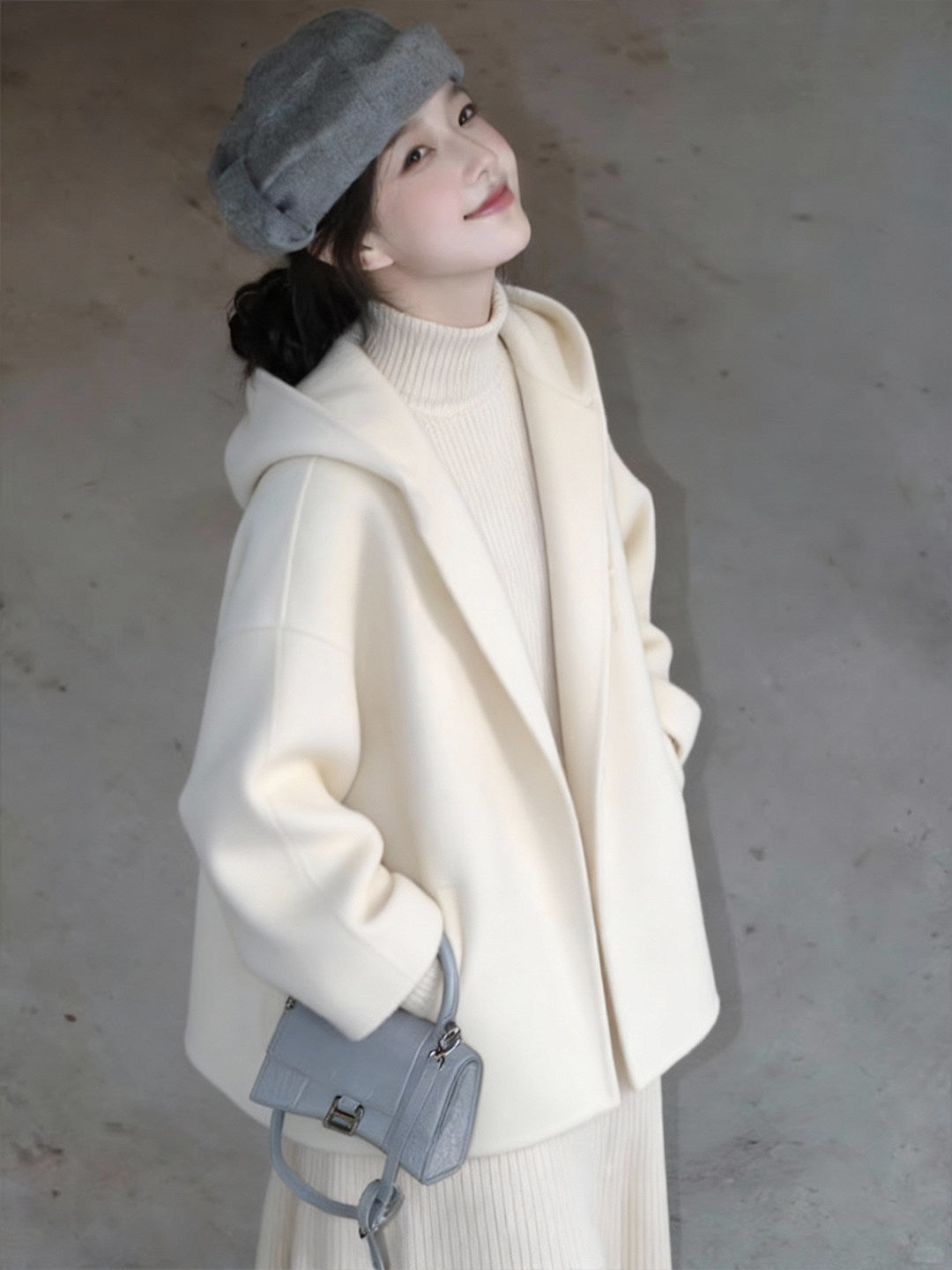 Manteau de laine à capuche blanche à double face pour femmes