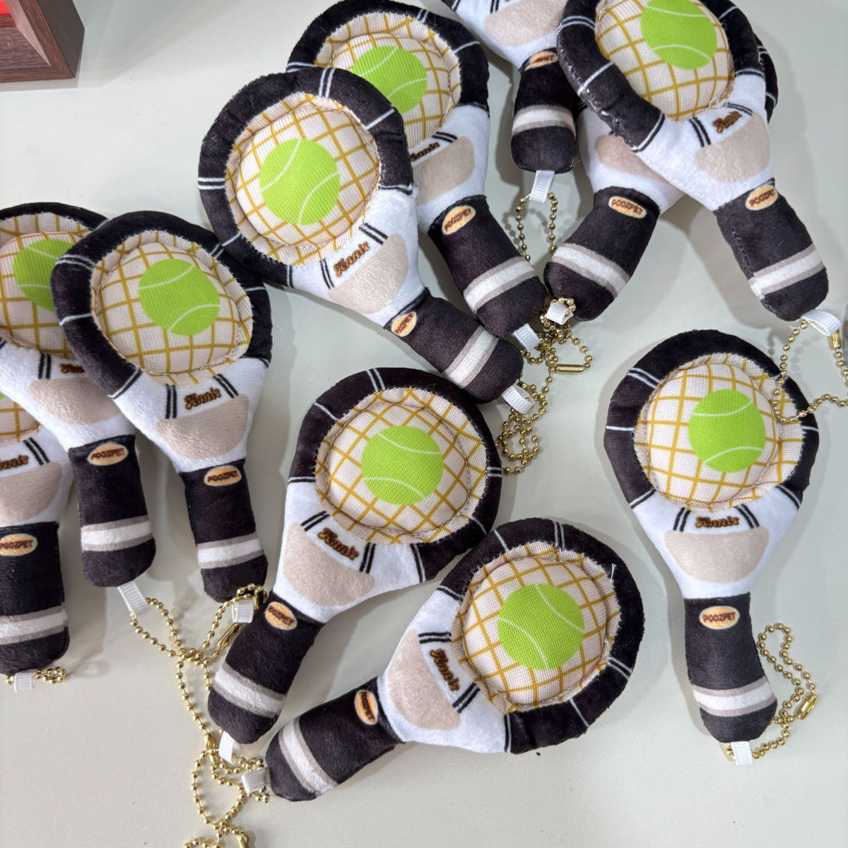 Interactive dog toy tennis racket bag charm