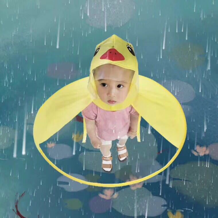 Petit canard jaune Saucer volant Enfants imperméable Caricature Poncho