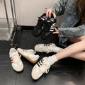 Chaussures de formation rétro en allemand noir