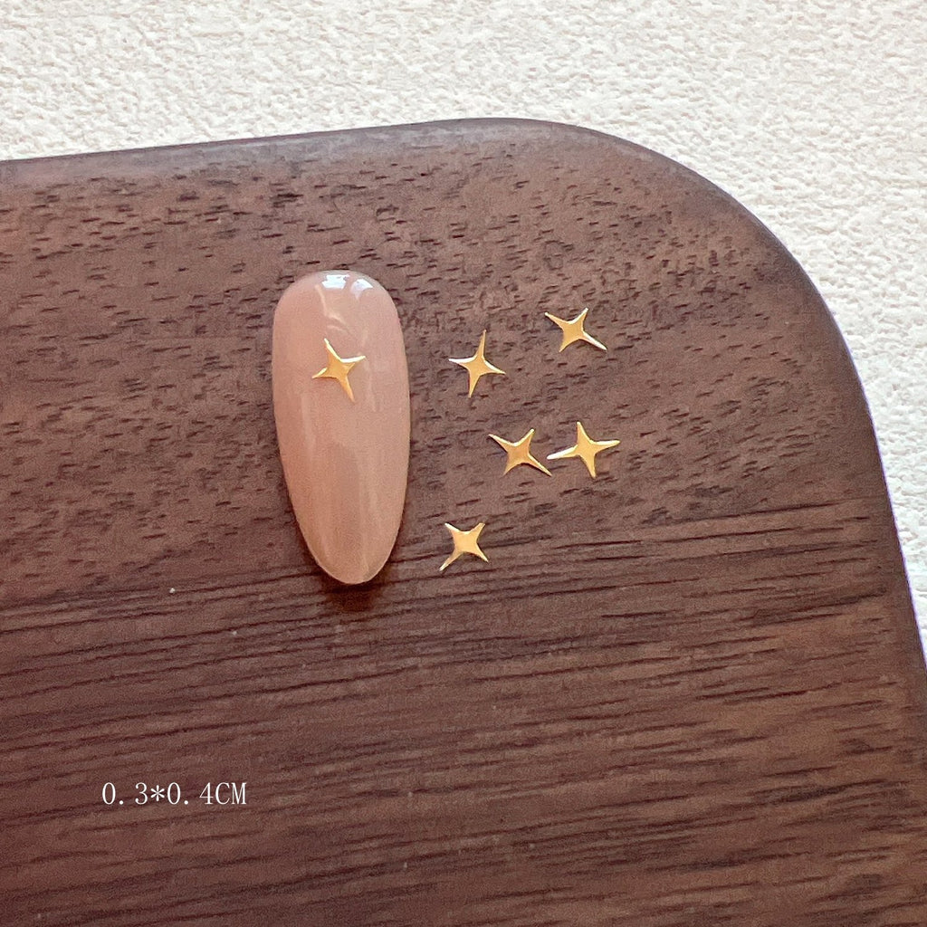 Flakes en métal d'art d'étoile d'or et d'argent