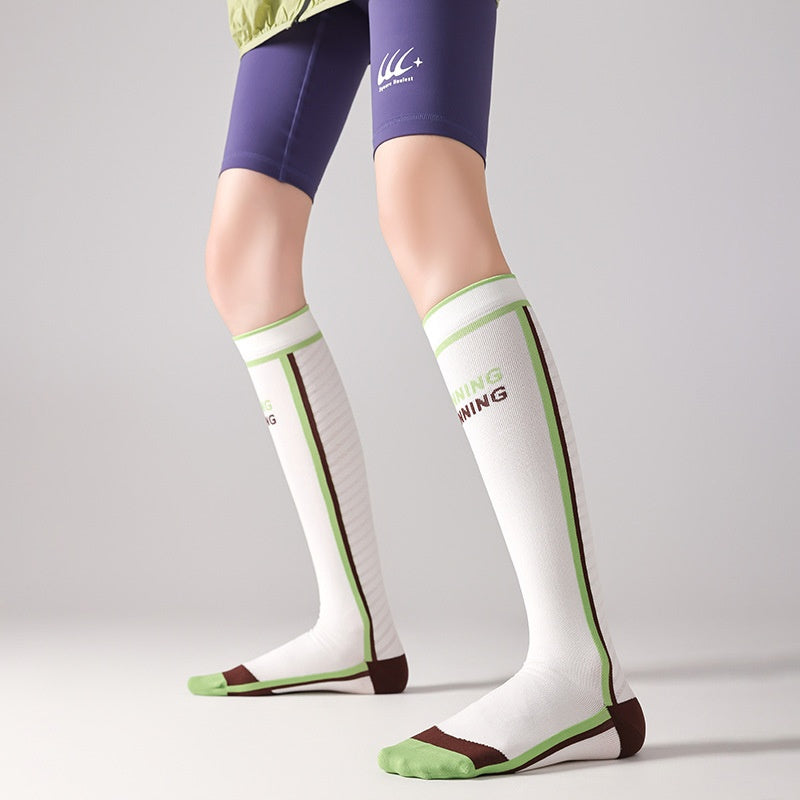 Chaussettes de calf à compression progressive pour femmes avec bandes de blocs de couleur