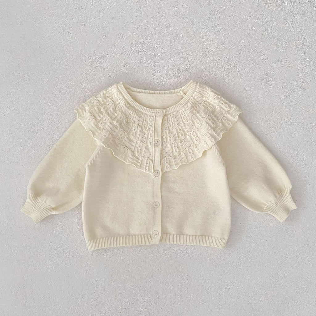 Manteau tricoté pour bébé