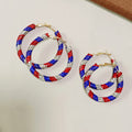 Boucles d'oreilles en forme de boucles d'enroulement entièrement diamantées